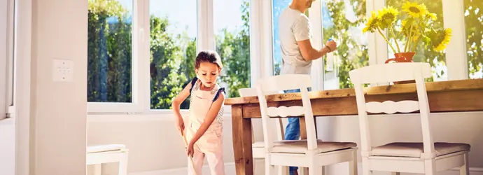 Father and daughter cleaning