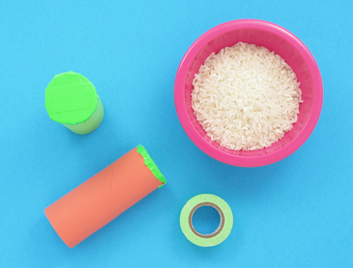 A bowl of dried rice to fill the paper tubes with