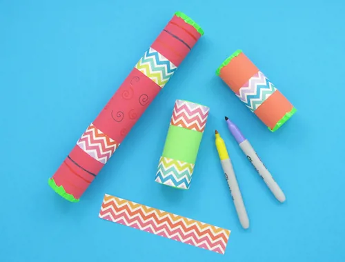 Different-sized tubes, decorated and filled with rice or beans to make a homemade musical shaker.